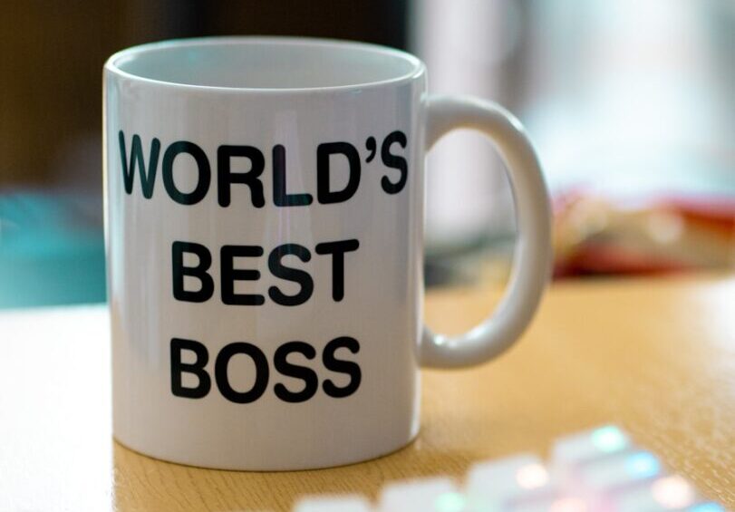white mug on brown surface